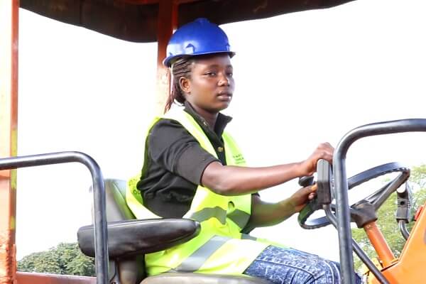 Nyakio Plant Operators female student operating an excavator