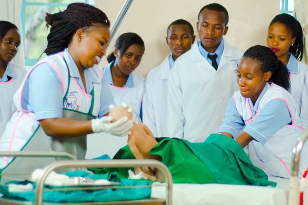 Outspan Medical College students during a practical lesson